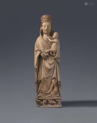 A carved limestone figure of the Virgin and Child, Normandy,...