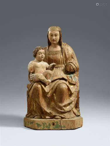 A North Italian carved wood figure of the Virgin Enthroned, ...