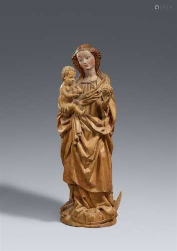 A Franconian carved limewood figure of the Virgin and Child,...