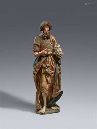 A carved wood figure of John the Baptist, presumably Bavaria...