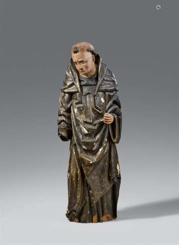 A South Tirolean carved wooden figure of a standing saint (p...