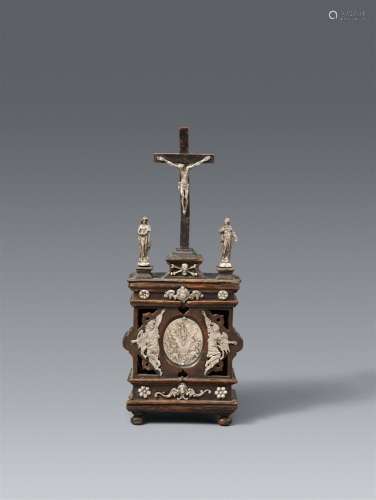 A small Augsburg carved walnut reliquary altar, first quarte...
