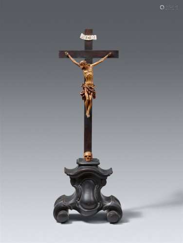 An 18th century Austrian carved wood crucifix