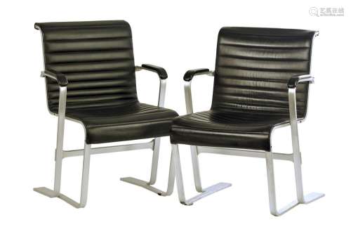 A PAIR OF ALUMINIUM FRAMED ARMCHAIRS AFTER A DESIGN BY MARCE...