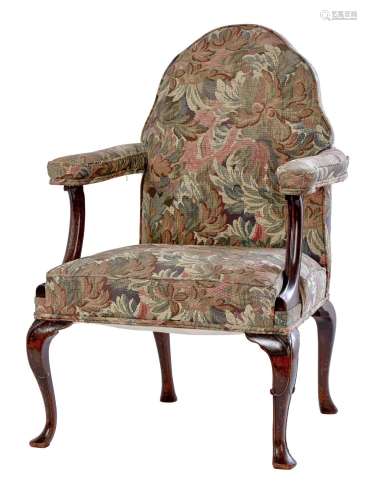 A QUEEN ANNE STYLE WALNUT AND UPHOLSTERED ARMCHAIR