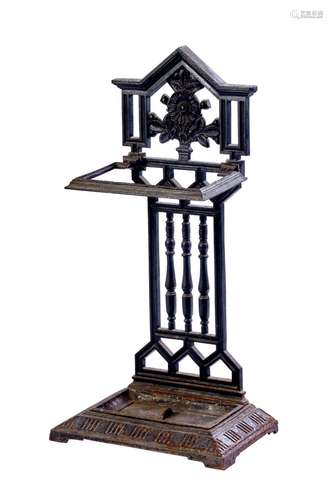 A VICTORIAN AESTHETIC MOVEMENT CAST IRON UMBRELLA STAND