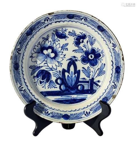 A BLUE AND WHITE DELFT CHARGER