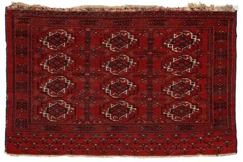 A SMALL TURKOMAN RUG AND A SADDLEBAG