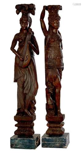 A PAIR OF FLEMISH CARVED WALNUT CARYATIDS