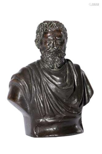 A SMALL BRONZED BUST OF MICHELANGELO