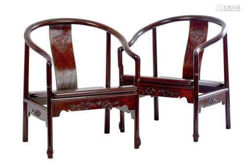 *A PAIR OF CHINESE ROSEWOOD YOKE BACK ARMCHAIRS *CITES permi...