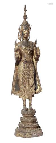 A THAI GILT BRONZE FIGURE OF THE STANDING BUDDHA