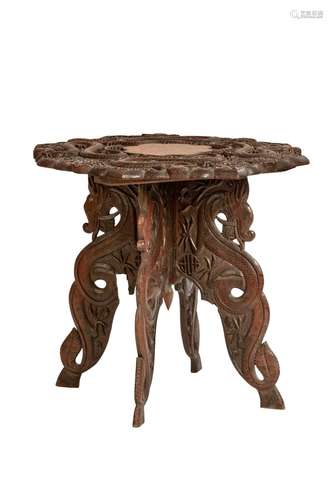 A KASHMIRI CARVED HARDWOOD OCCASIONAL TABLE IN THE CHINESE M...