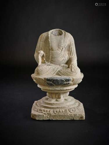 A CHINESE MARBLE SEATED TORSO OF BUDDHA