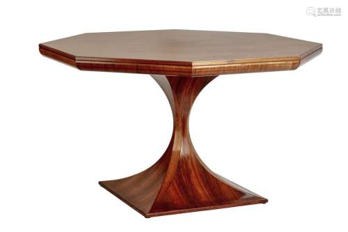 *AN OCTAGONAL ROSEWOOD CENTRE TABLE ATTRIBUTED TO CARLO DI C...