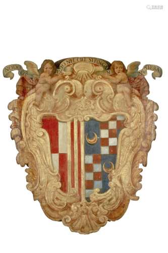 AN ITALIAN PAINTED AND GILDED COAT OF ARMS (STEMMA)