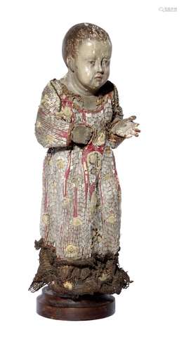 A CARVED AND POLYCHROME WOODEN FIGURE OF THE CHRIST CHILD