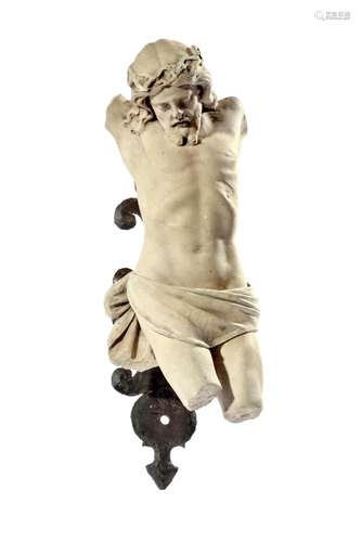 A CARVED MARBLE CORPUS FIGURE