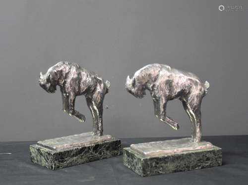 Pierre LAUREL 1892-1962)., Paire de serre-livres en bronze a...