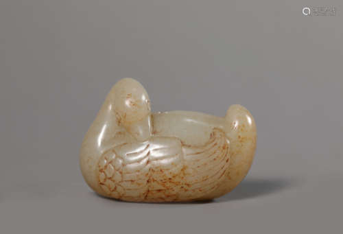 A Carved Russet Jade Goose Ornament