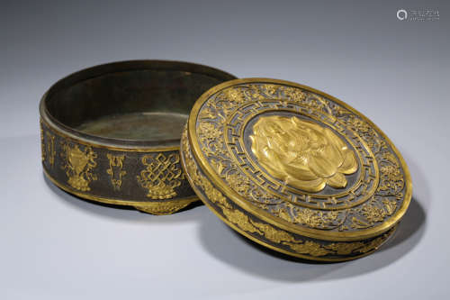 A Gilt Bronze Eight Treasures Box and Cover