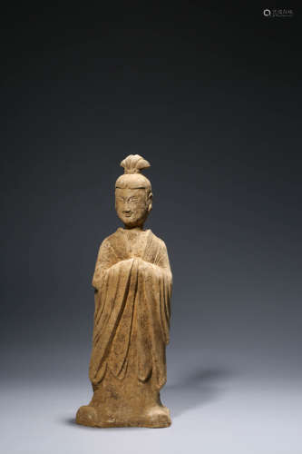 A Carved Pottery Figurine