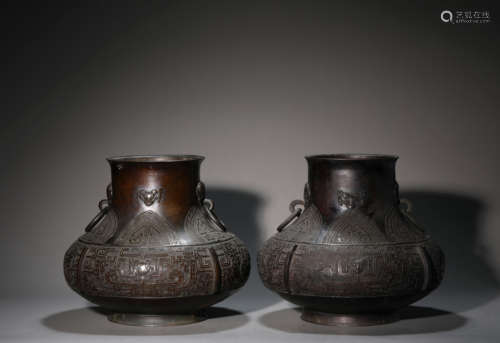 A Pair of Bronze Taotie Pattern Loop-Handles Zun Vases