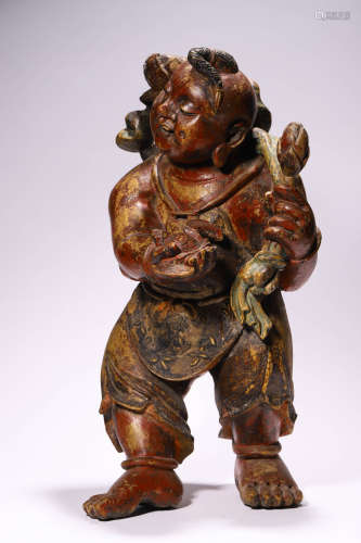 A Carved Wood Figure of Boy
