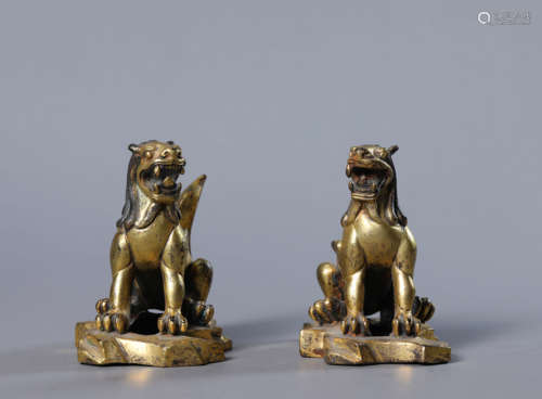 A Pair of Gilt Bronze Mythical Beast Ornaments