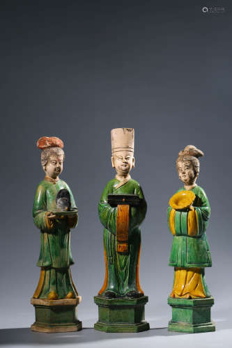 A Set of Three Painted Pottery Figures