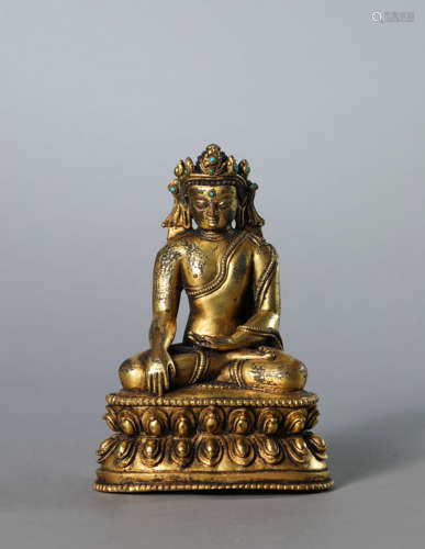 A Gilt Bronze Figure of Crowned Shakyamuni