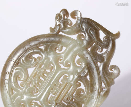 A Carved Russet Jade Chilong Pendant