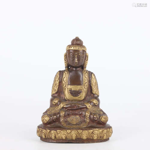 A Bronze Figure of Seated Buddha