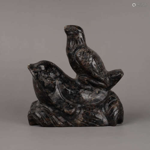 A Carved Stone Bird Ornament