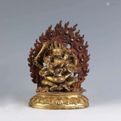 A Gilt Bronze Figure of Jambhala