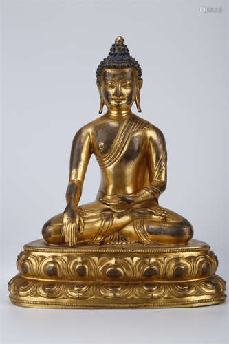 A Gilt Copper Sakyamuni Buddha Statue.