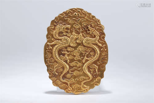 A Gilt Copper Token with Dragon Design.