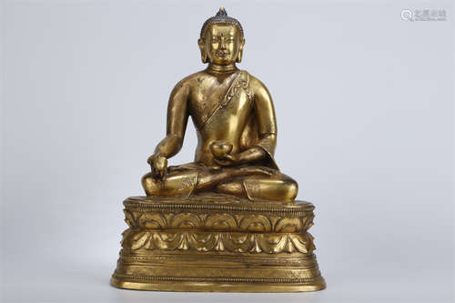 A Gilt Copper Bhaisajyaguru Buddha Statue.