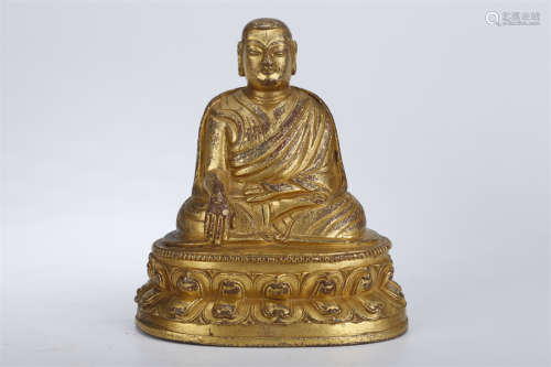 A Gilt Copper Guru Buddha Statue.