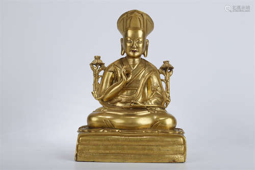 A Gilt Copper Guru Buddha Statue.