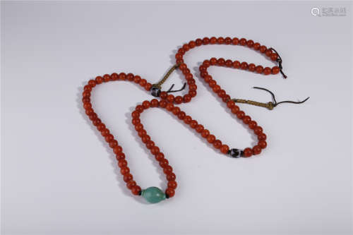 A String of Drilled Agate Buddha Beads