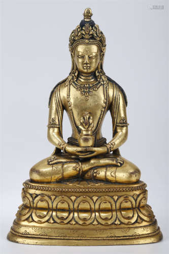 A Gilt Copper Amitayus Buddha Statue.