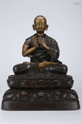 A Copper Guru Buddha Statue.