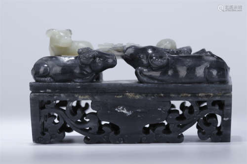 A Hetian Jade Blue-and-White Sculpture.