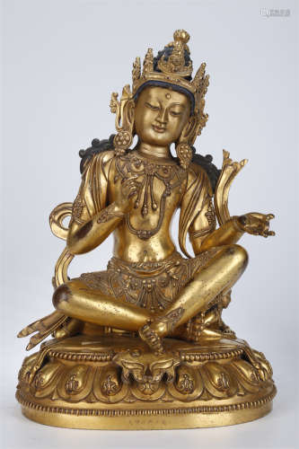 A Gilt Copper Guanyin Bodhisattva Statue.