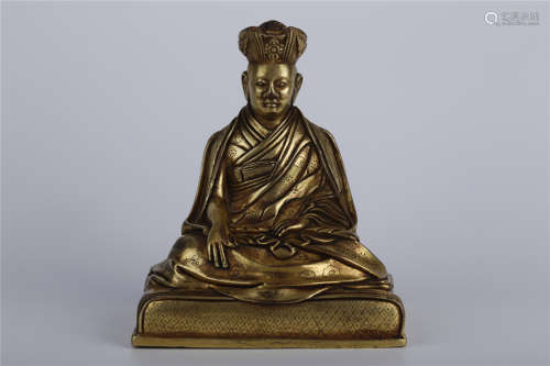 A Gilt Bronze Guru Buddha Statue