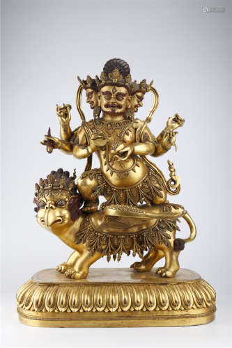A Gilt Copper Six-Arm Mahakala Buddha Statue.