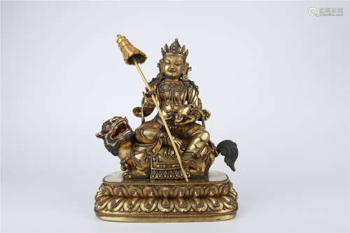 A Gilt Copper Vaisravana Buddha Statue, Ming Dyn.