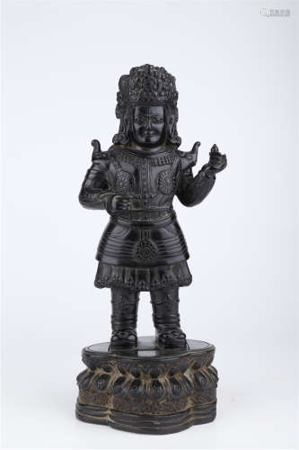 A Black Stone Standing Vaisramana Buddha Statue