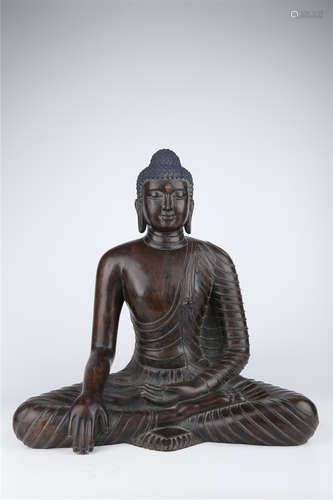 A Huanghuali Wood Sakyamuni Buddha Statue